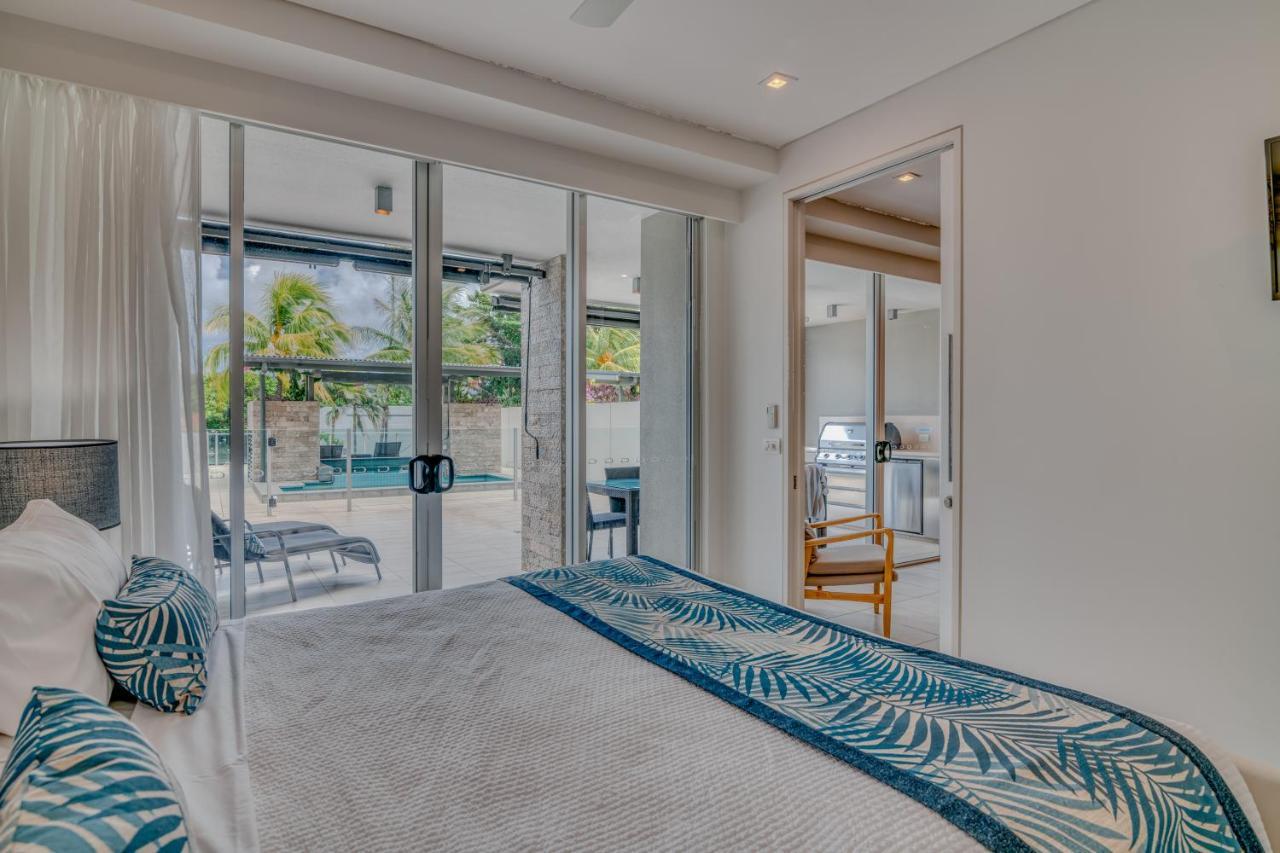 Coconut Grove Aparthotel Port Douglas Bagian luar foto